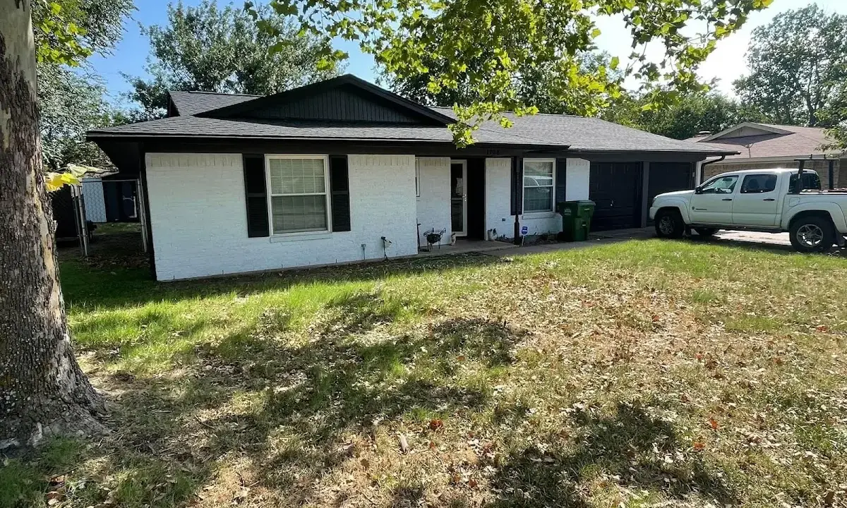 Professional roofing crew working on a residential roof in Silver Springs Shores